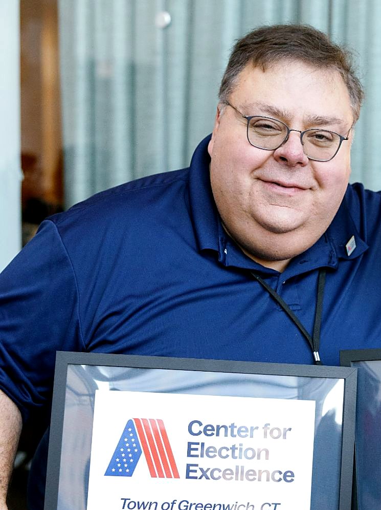 Fred DeCaro with the Center for Election Excellence plaque